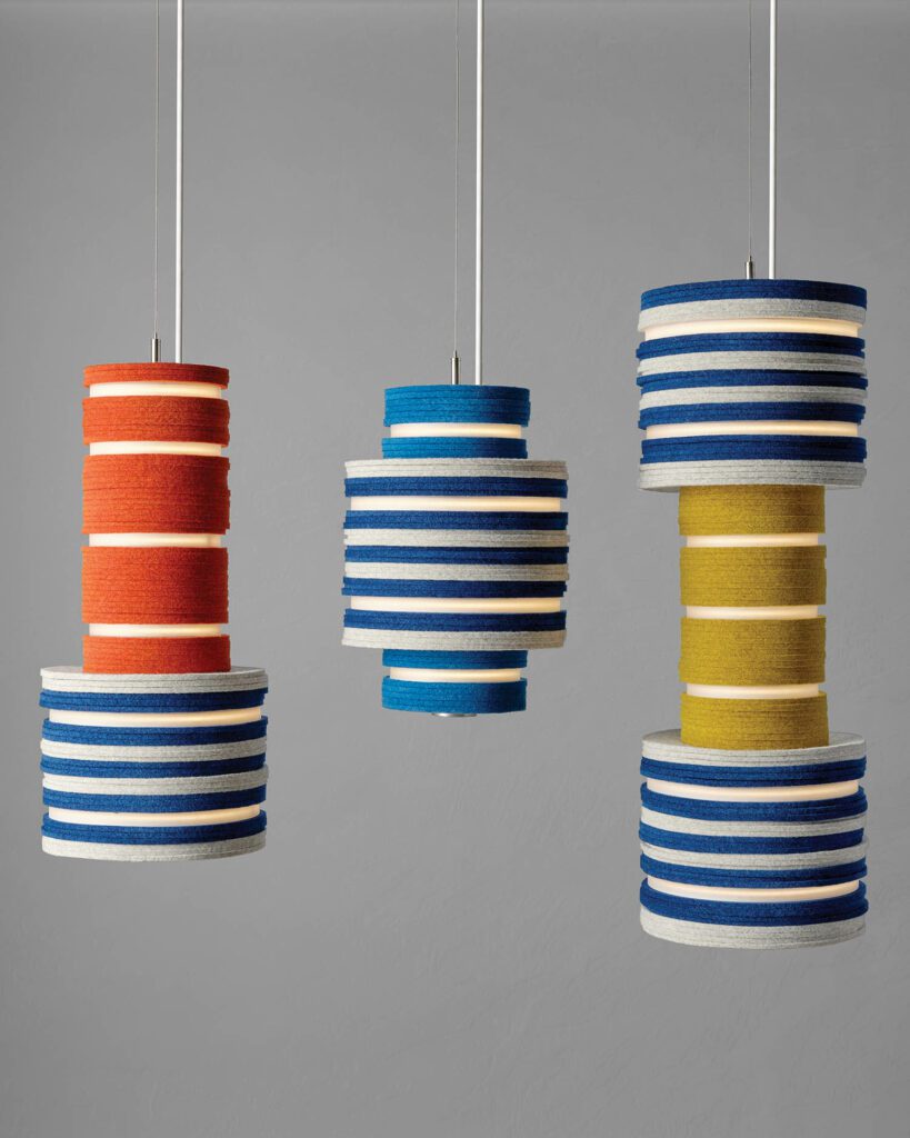 Wisse Trooster’s Hugo, Paco, and Luis pendant fixtures in merino felt, recycled aluminum and PET, and cast-acrylic discs by Stackabl, a collaboration between Stacklab and Maison Gerard.